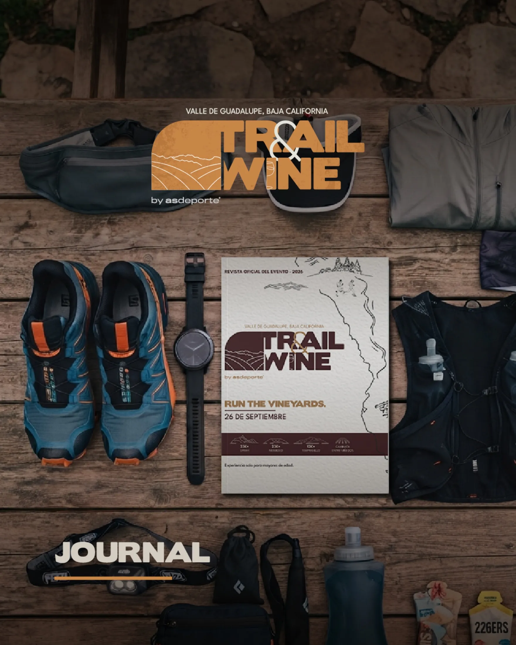 Trail & Wine race-weekend kit flat lay, with the official event journal cover among the gear.